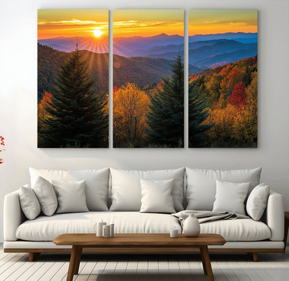 Vibrant sunset over autumn mountains with colorful trees and warm light, ideal for nature lovers or cabin-style wall decor.