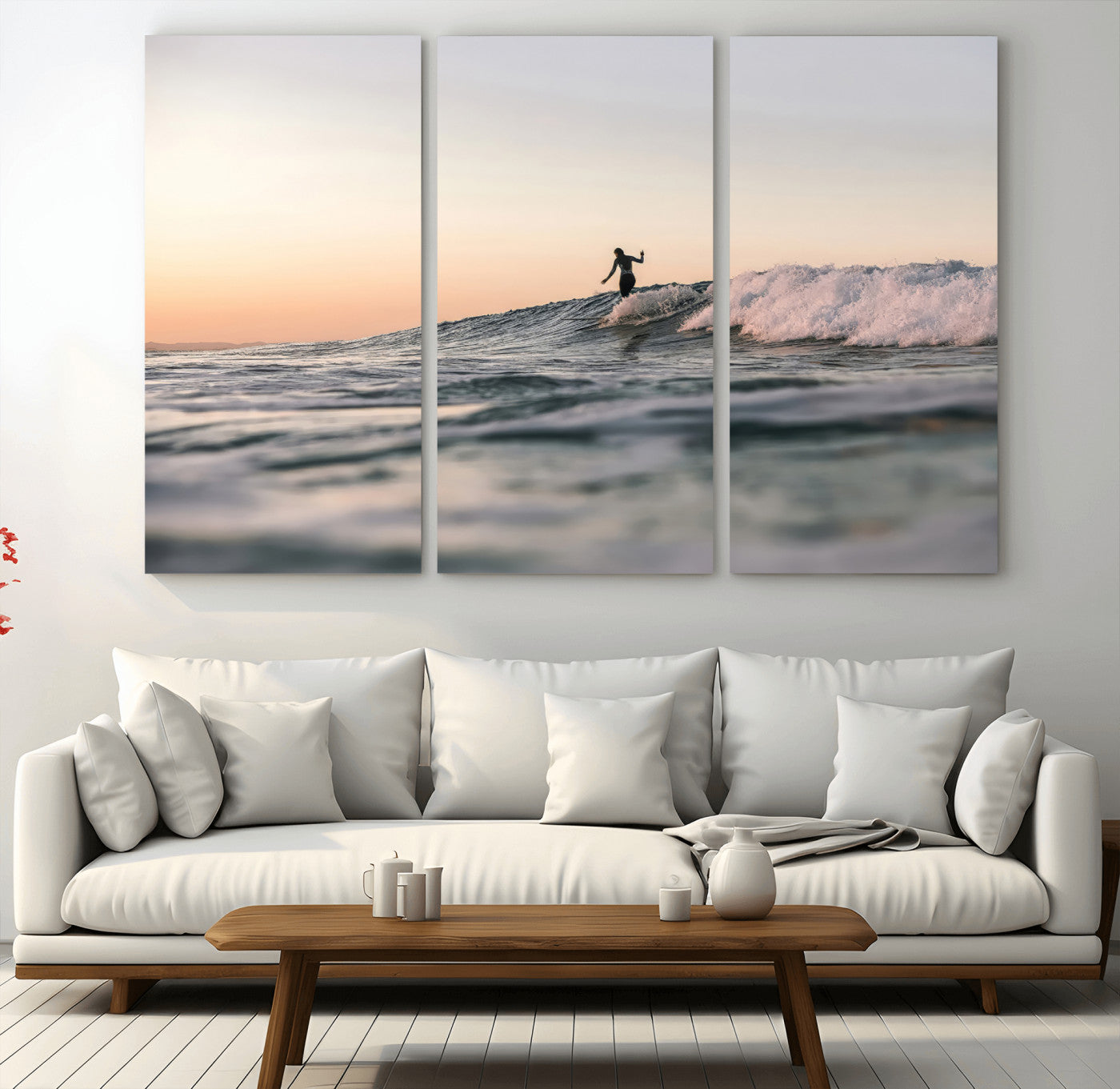 Framed canvas of a female surfer balancing on a wave at sunset, perfect for serene surf or ocean-inspired coastal decor.