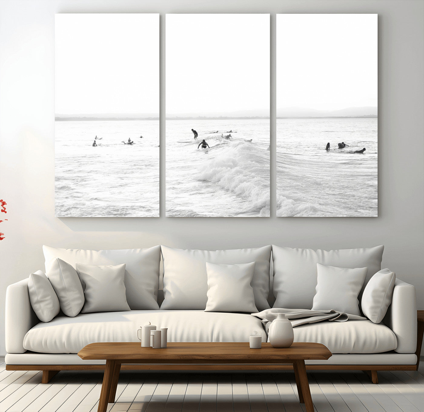 Monochrome photo of surfers riding and waiting on ocean waves, ideal for surf-themed or coastal energy wall decor.