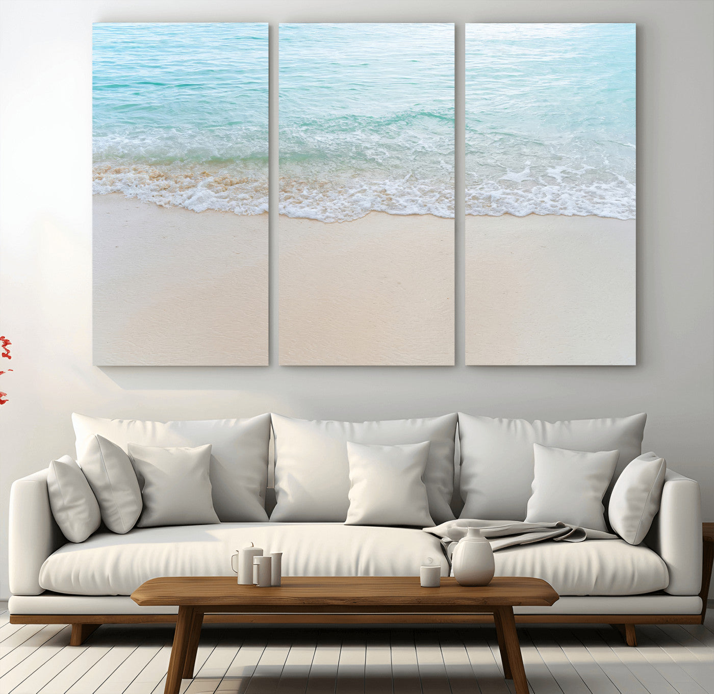 Soft shoreline with gentle aqua waves on smooth sand, ideal for minimalist coastal or pastel ocean-inspired home wall decor.