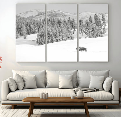 Snowy bison walking through white forest landscape, ideal for monochrome winter or wilderness-style interior wall decoration.