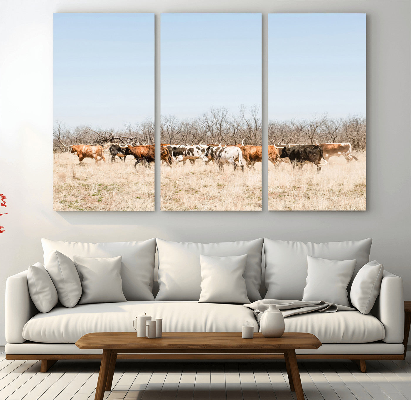 Framed wall art of Texas longhorn cattle walking through a dry, neutral-toned prairie, perfect for rustic farmhouse or western-themed home decor.