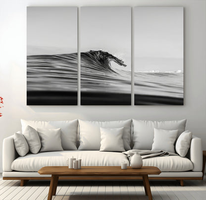 Striking black and white photo of a curling wave, ideal for modern coastal or minimalist wall decor settings.