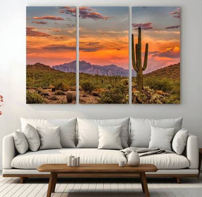 Vibrant desert sunset with saguaro cacti and distant mountains, perfect for Southwestern or warm-toned home decor.