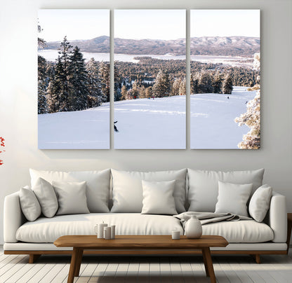 Canvas of a snowy mountain ski slope with pine trees and bright winter light, ideal for modern rustic or alpine-inspired home decor.