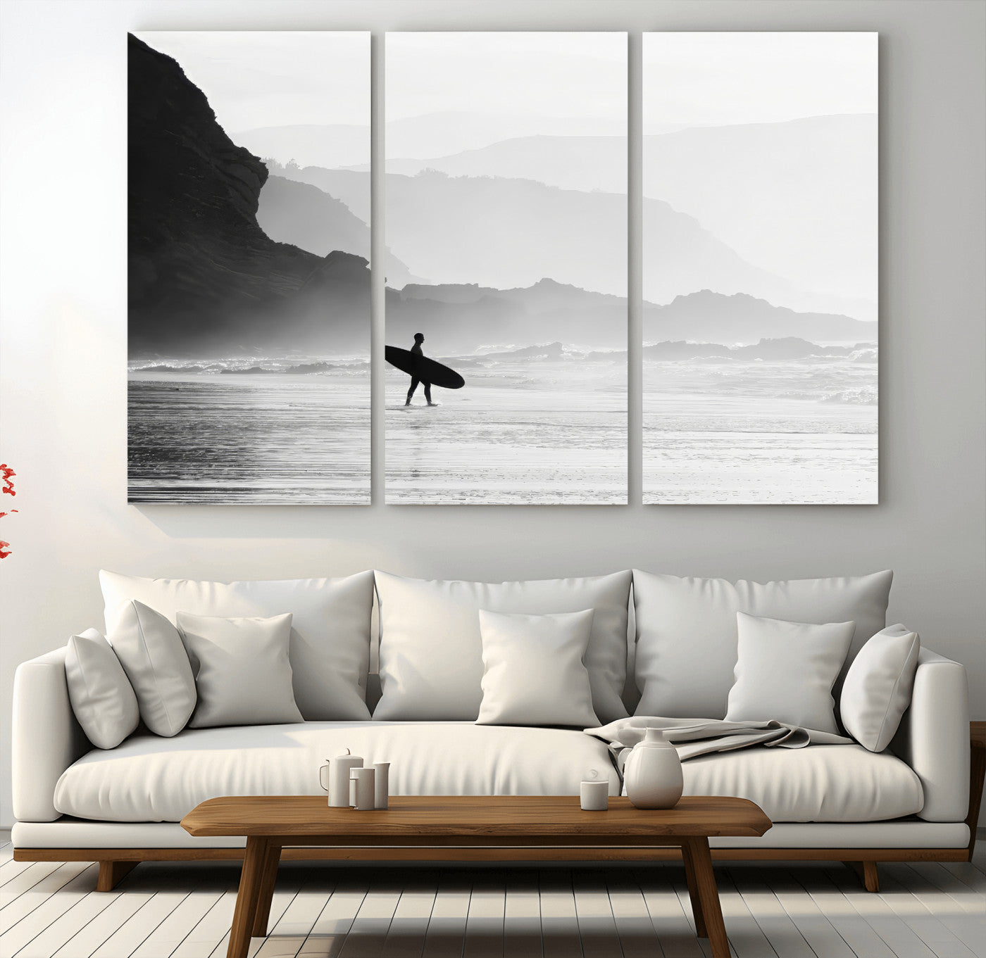 A lone surfer walking along a misty beach with cliffs in the background, carrying their board, capturing a serene and minimal ocean moment.