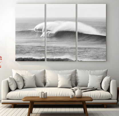 A dramatic black and white ocean wave crashing with immense force, capturing the raw power and movement of the sea in a bold seascape.