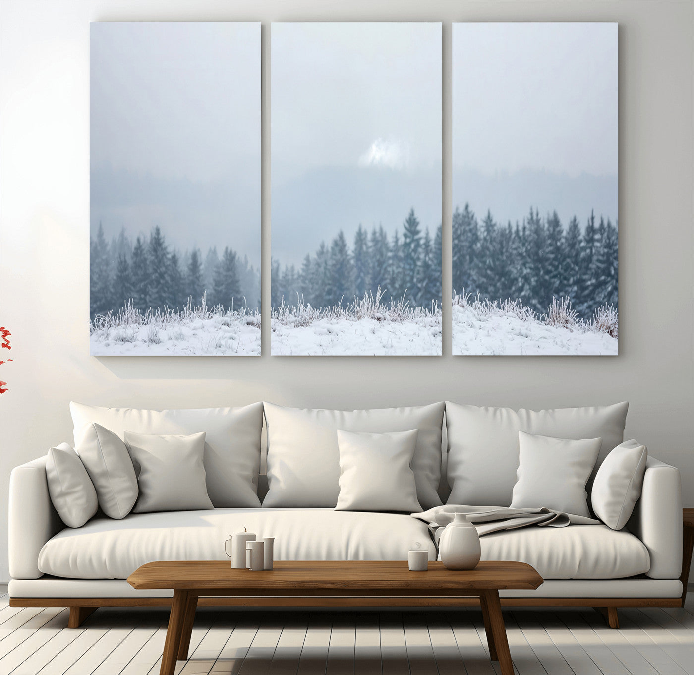Snow-covered forest under misty sky, soft light breaking through clouds, ideal for minimalist or Nordic-inspired home decor.