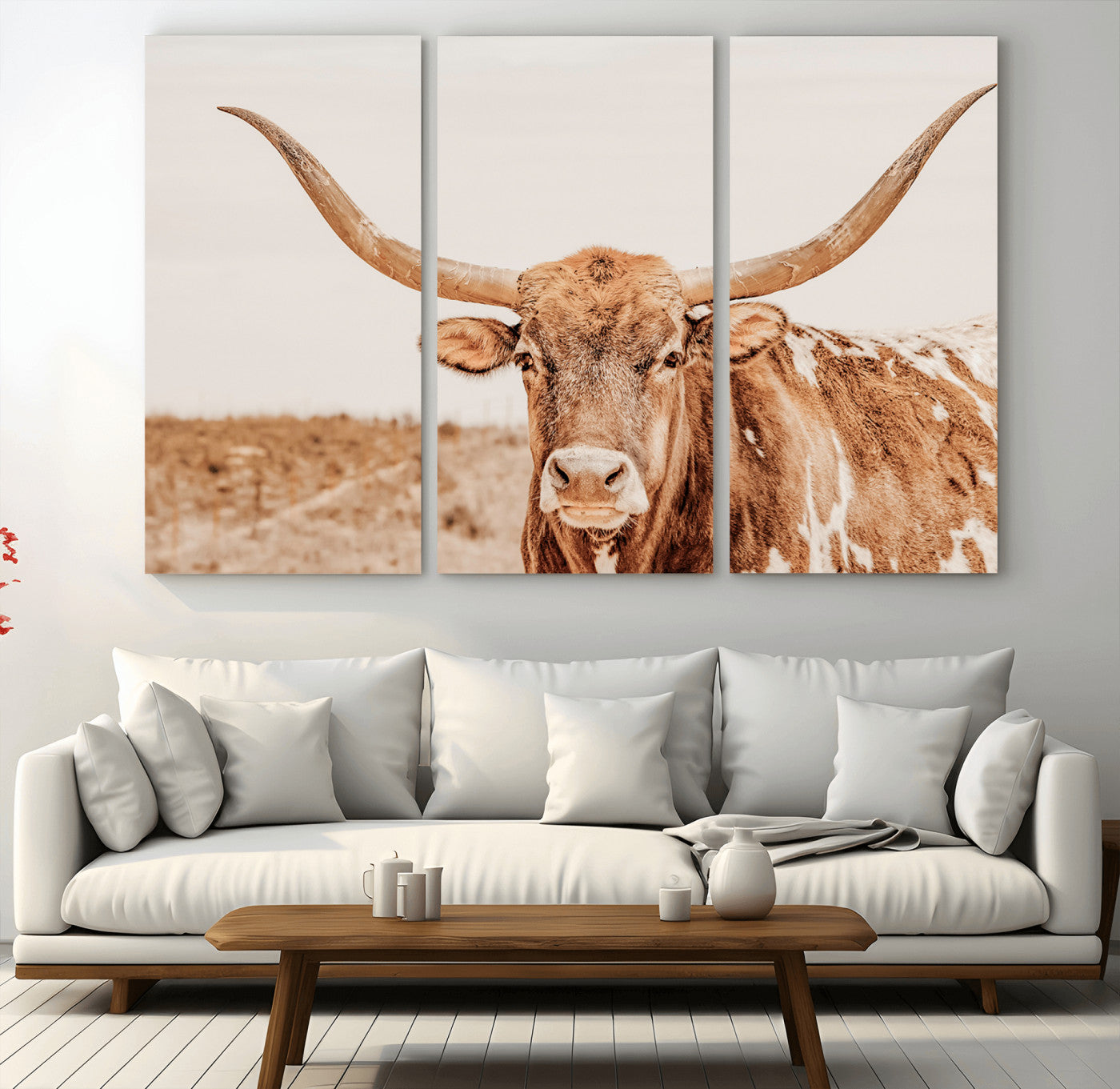 A longhorn bull standing proudly in a sunlit desert field with warm neutral tones, ideal for rustic western or farmhouse interiors.
