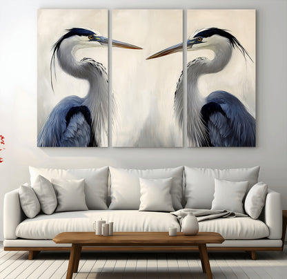 Two blue herons facing each other on a soft neutral background, ideal for coastal, tranquil, or nature-inspired minimalist interiors.