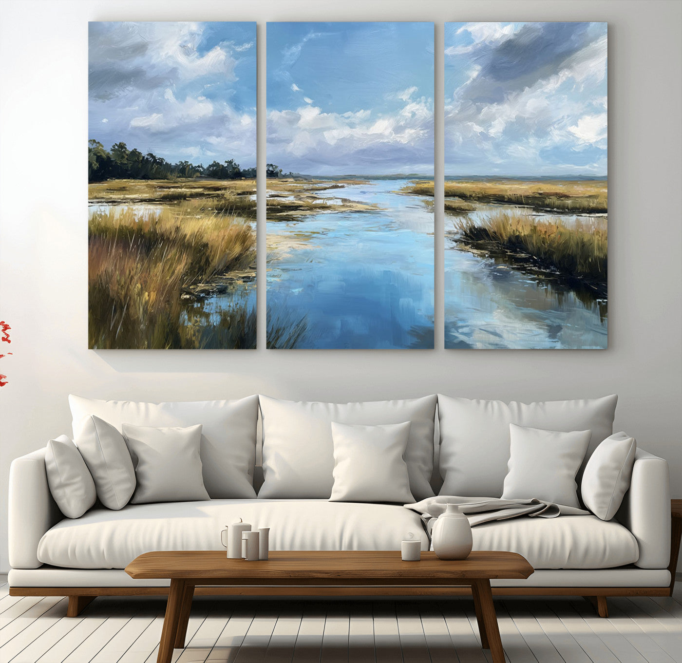 A beautiful, painterly landscape of a calm river winding through a marsh, with vibrant green grasses and a bright blue sky filled with fluffy clouds.