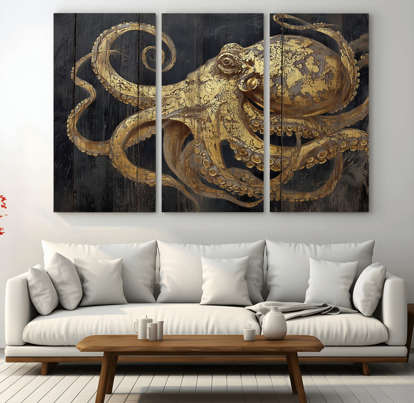 A detailed gold illustration of an octopus on black wooden planks, showing its intricate tentacles and textured skin in an artistic style.