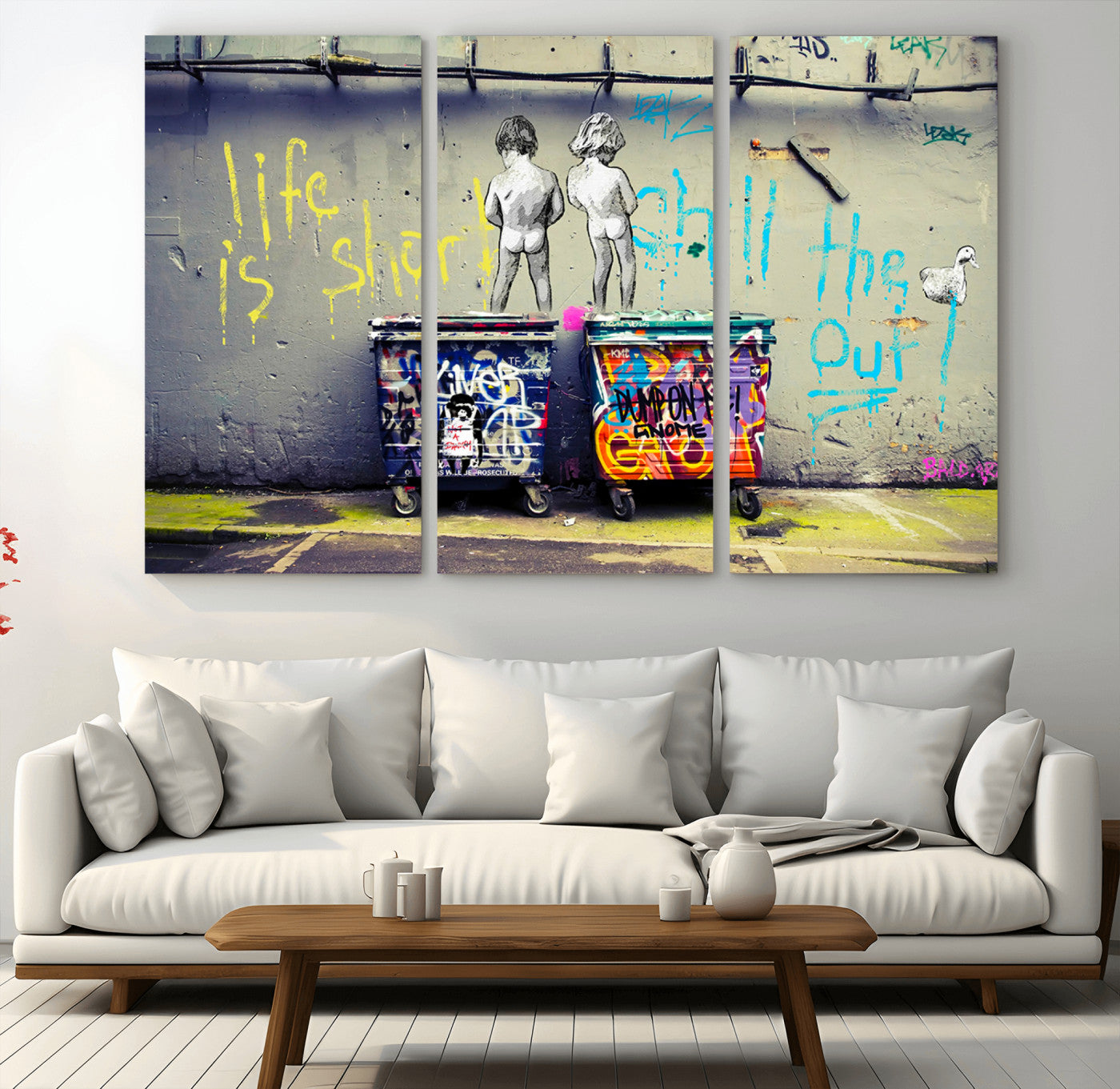 Graffiti-style canvas art with bold text and two naked figures over urban dumpsters, ideal for edgy or street-style decor.