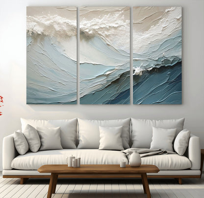 Textured canvas of ocean waves in soft coastal blues and creamy whites, ideal for modern or minimalist coastal-style interiors.