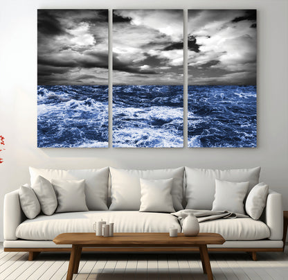 Moody canvas wall art of a stormy ocean under a dramatic black-and-white sky, perfect for bold or coastal-style interiors.