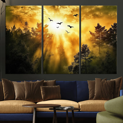 Canvas of a golden forest at sunset with birds flying through glowing sunbeams and silhouetted pine trees, ideal for warm-toned rustic decor.