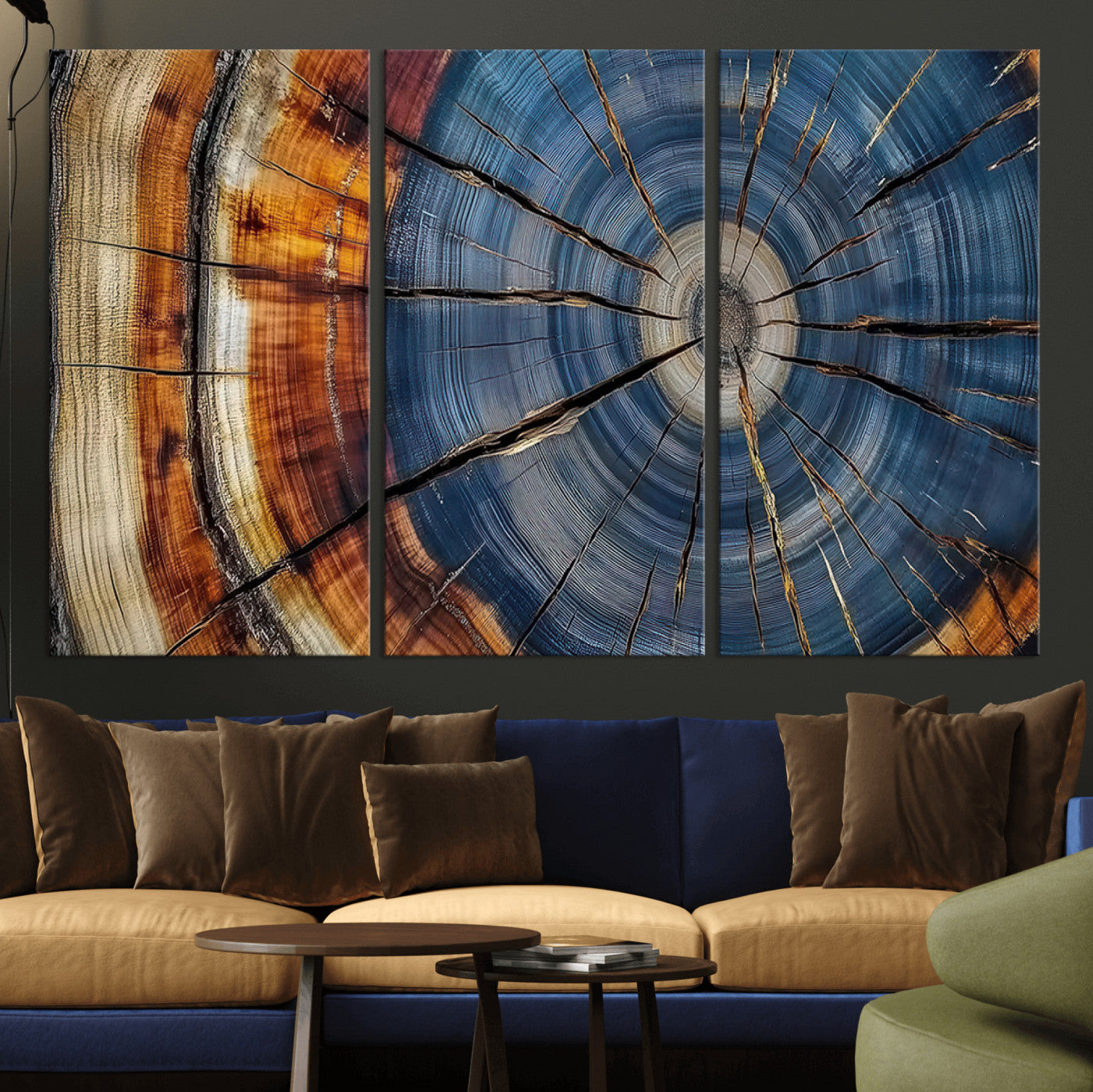 A stunning close-up view of a tree trunk, showcasing the intricate growth rings in a vibrant mix of warm browns, cool blues, and hints of natural texture.