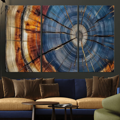 A stunning close-up view of a tree trunk, showcasing the intricate growth rings in a vibrant mix of warm browns, cool blues, and hints of natural texture.