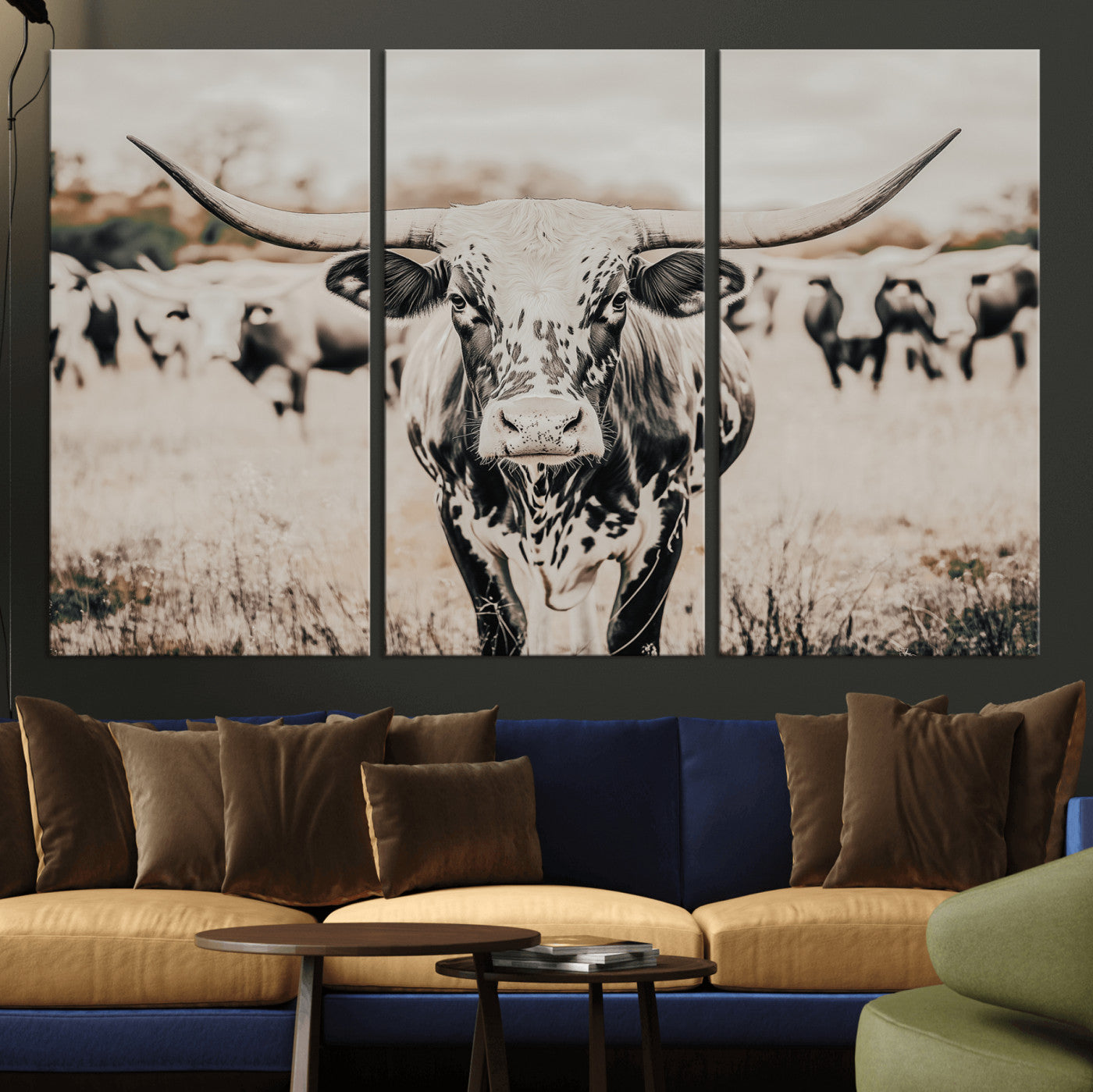 Canvas of a speckled Texas longhorn standing boldly in a field with a herd behind, perfect for rustic western or farmhouse wall decor.