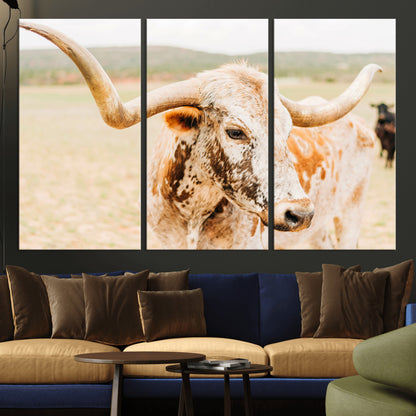 Close-up of a speckled Texas Longhorn in warm prairie tones, perfect for rustic western or countryside-themed room decor.