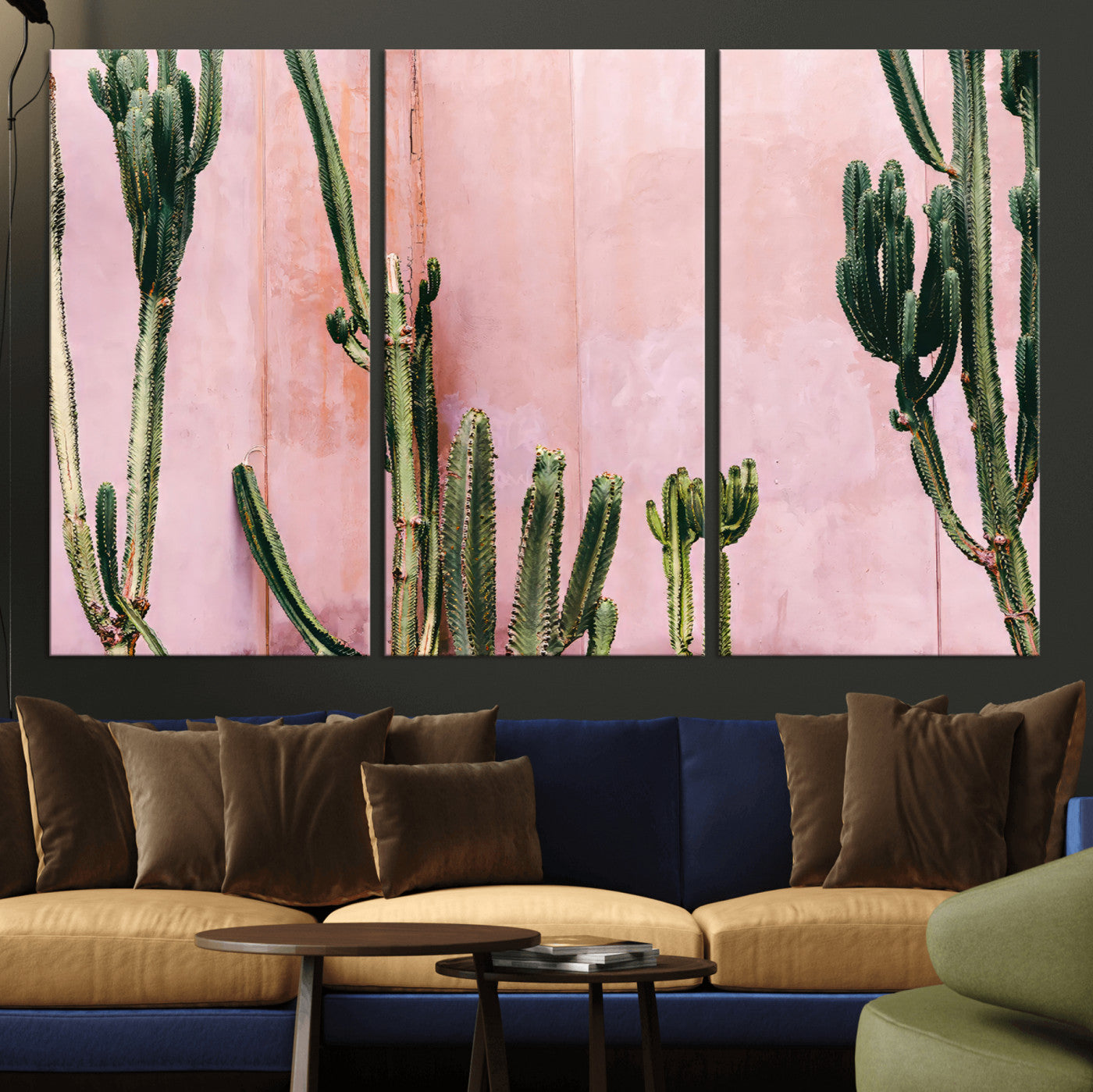 Framed canvas of tall green cacti against a soft pink wall, ideal for modern desert or colorful southwest-inspired home decor.