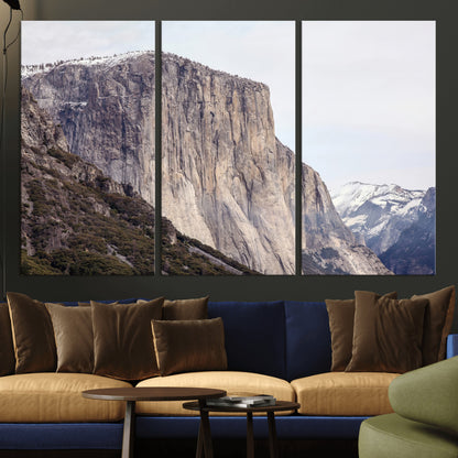 Framed canvas of El Capitan’s vertical granite face in Yosemite with snowy peaks, ideal for Sierra minimalism or mountain-inspired decor.