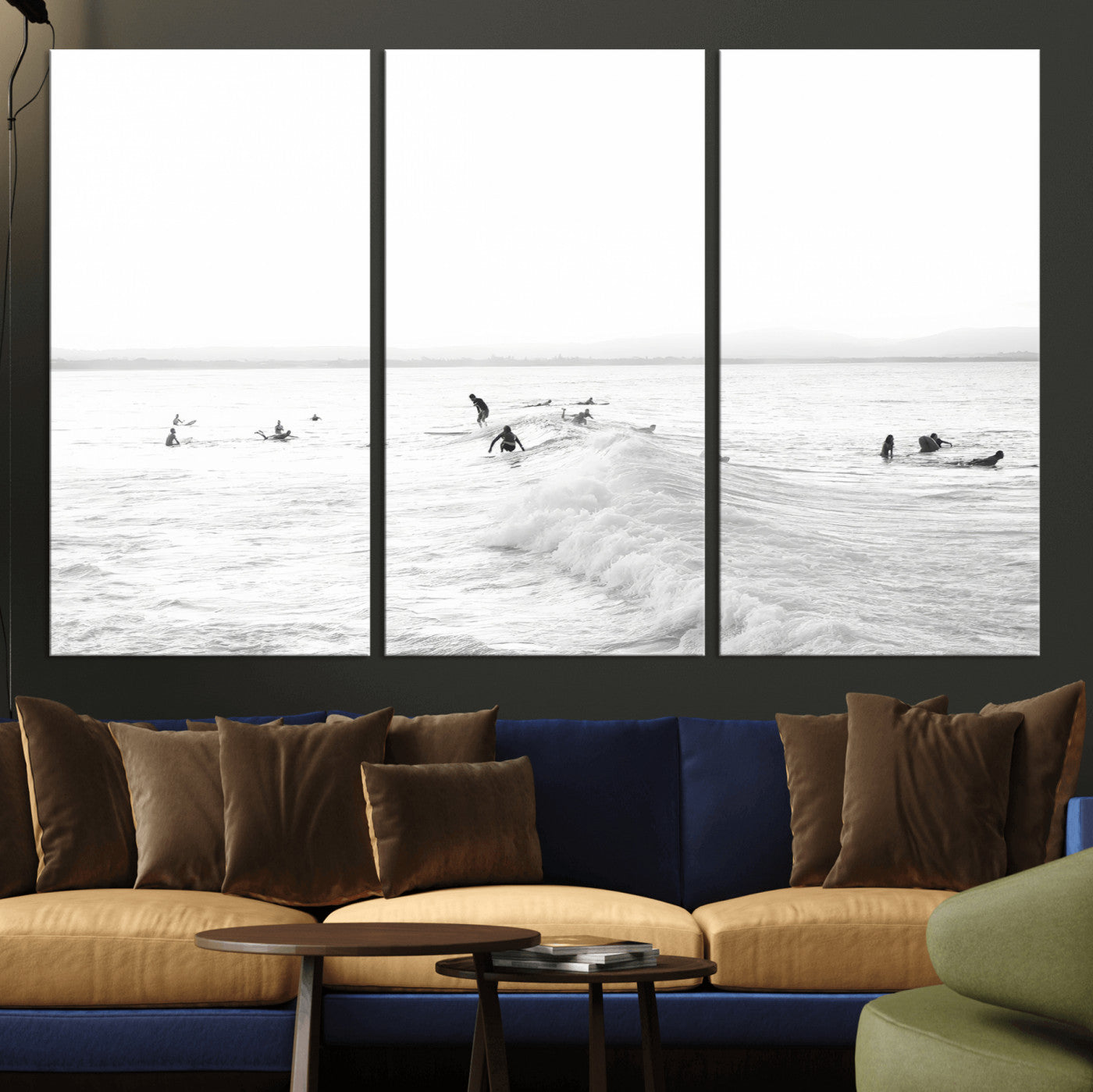 Monochrome photo of surfers riding and waiting on ocean waves, ideal for surf-themed or coastal energy wall decor.