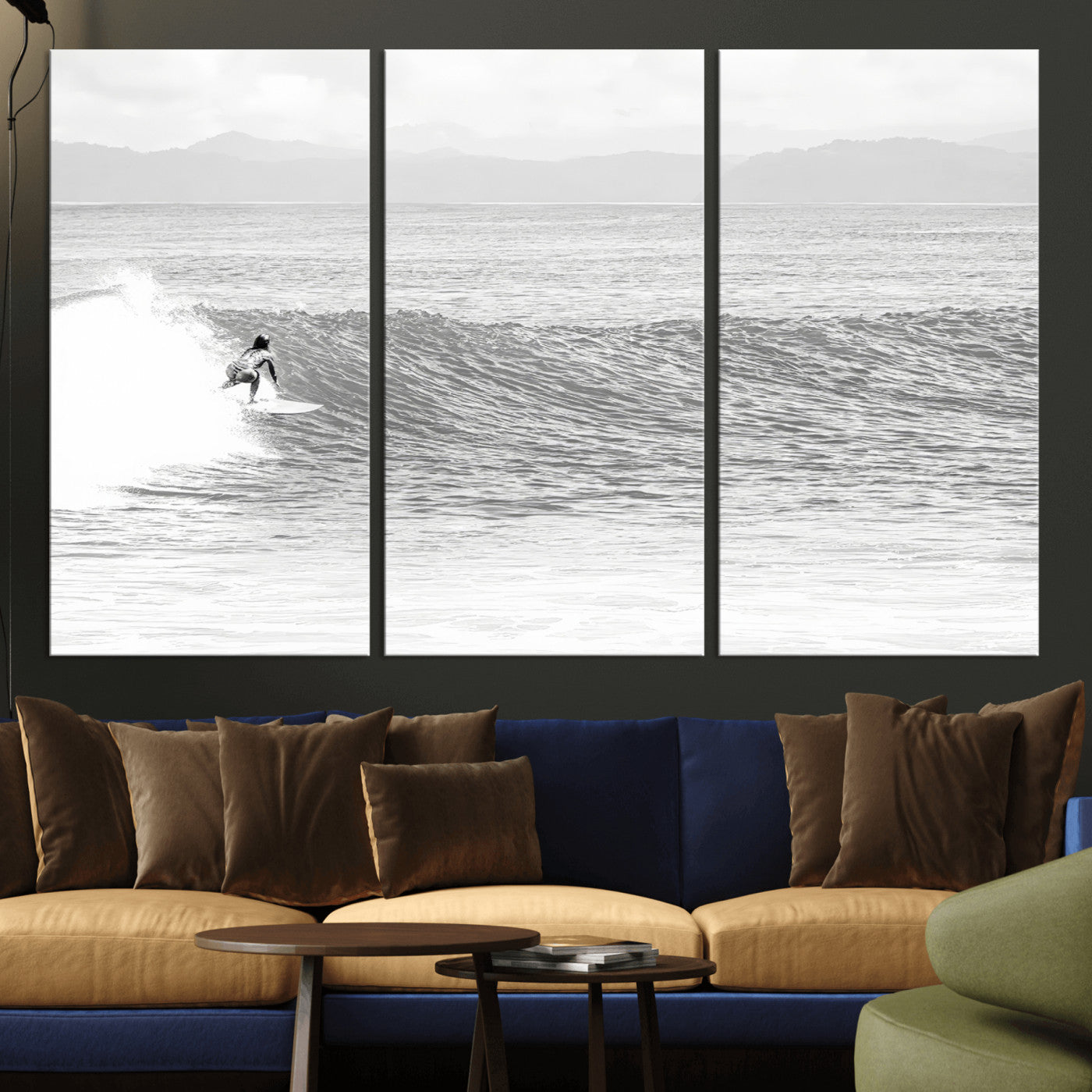 Monochrome photo of a surfer riding a wave with distant mountains, ideal for coastal motion or black and white surf-themed wall decor.