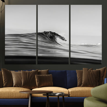 Striking black and white photo of a curling wave, ideal for modern coastal or minimalist wall decor settings.