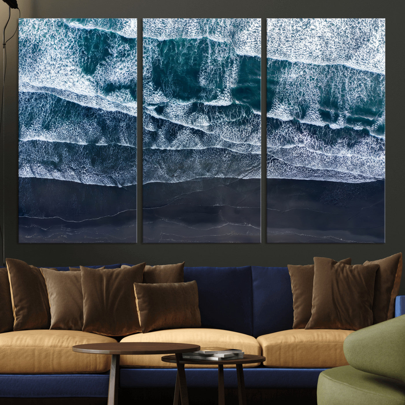Canvas of aerial ocean waves crashing onto a black sand beach in moody tones, ideal for modern coastal or minimalist home decor.
