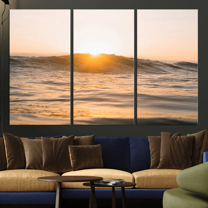 Ocean waves glowing under a warm golden sunset, reflecting soft light and calm movement, perfect for warm minimalist coastal interiors.