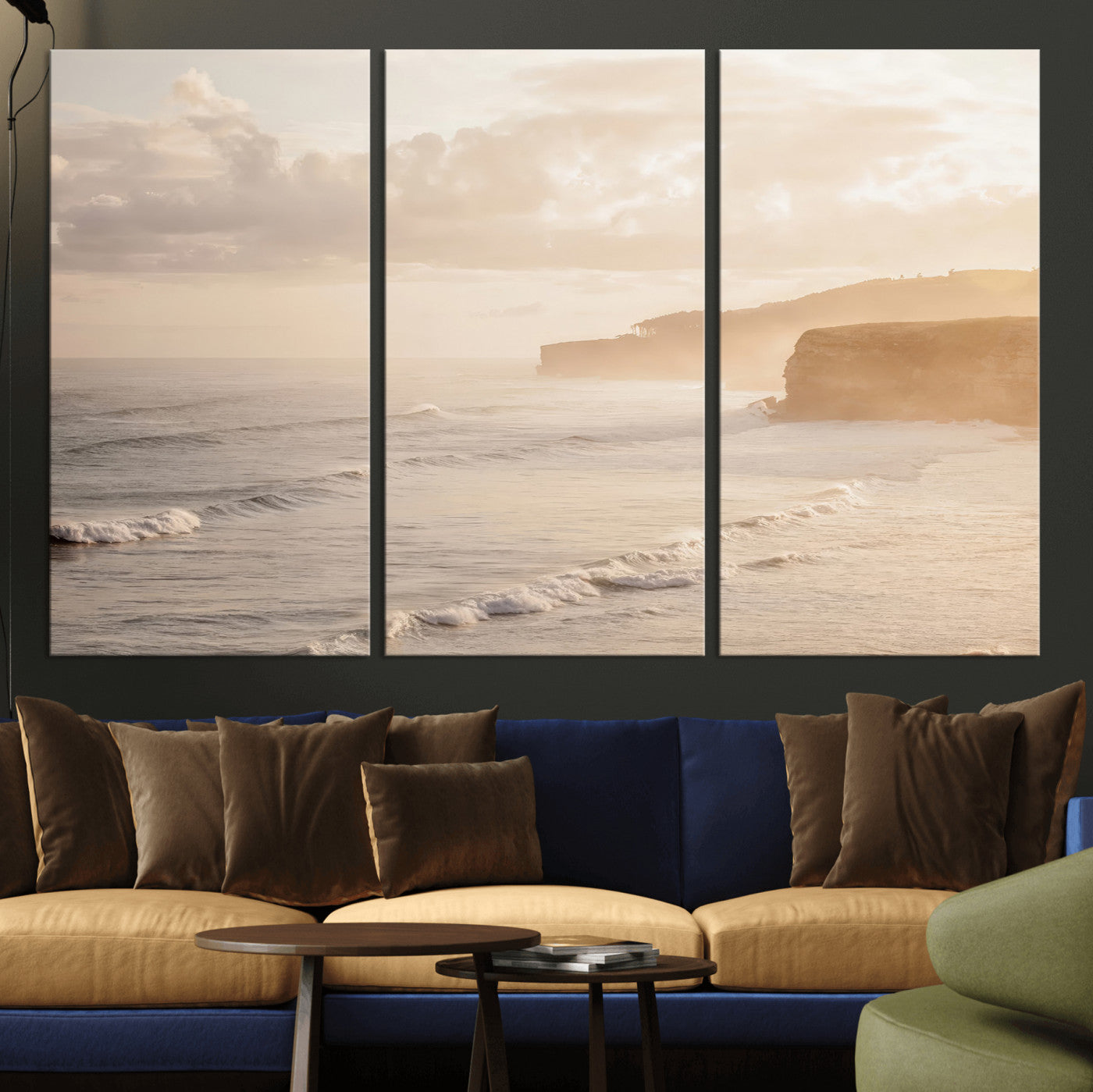 Golden hour seascape with misty cliffs and gentle waves rolling towards the shore, capturing a tranquil and warm coastal atmosphere.
