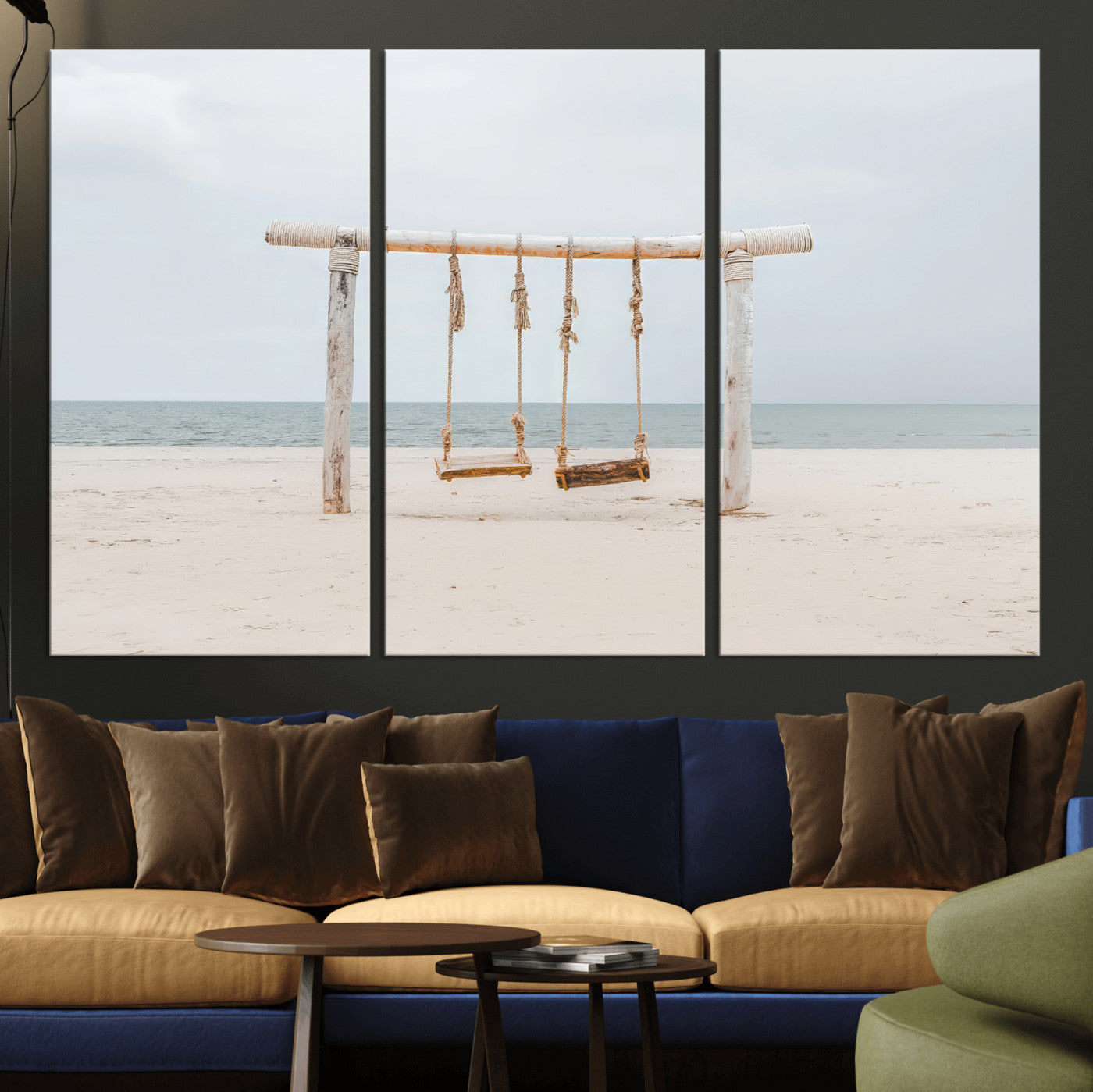 A rustic wooden beach swing stands on a serene sandy shore with an ocean horizon in the background, creating a tranquil and dreamy coastal escape.