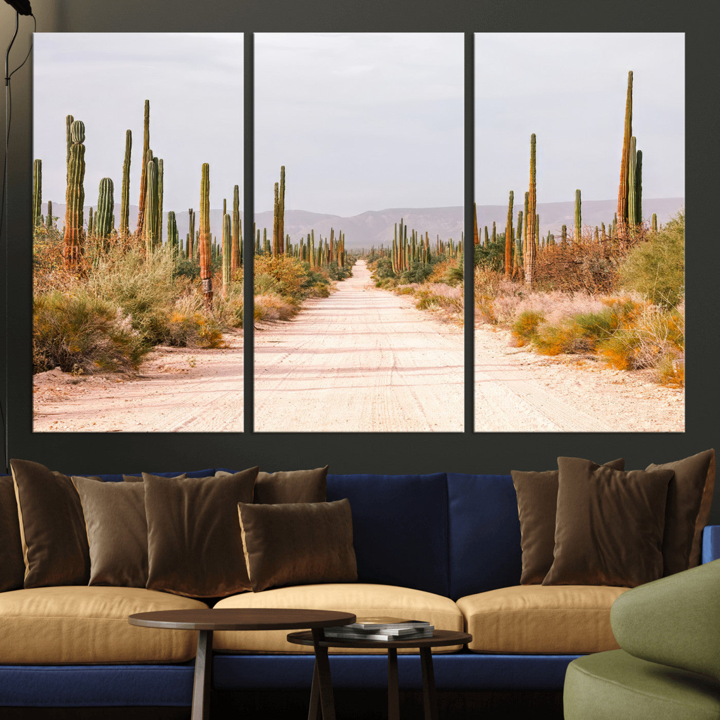A desert road lined with saguaro cacti under a golden sky, creating a warm southwestern feel, perfect for boho or rustic decor.