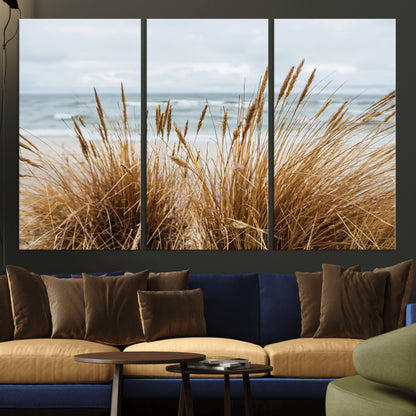 Canvas of golden beach grass swaying by the ocean under a soft cloudy sky, perfect for neutral-toned or coastal minimalist decor.