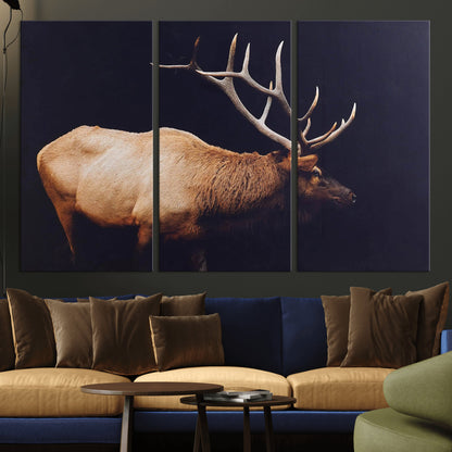 Side view of a majestic elk with large antlers against dark background, perfect for rustic lodge or cabin style home decoration.