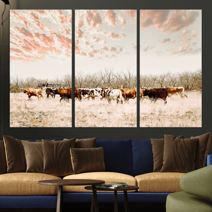 Cattle herd in a soft-toned field under a pastel pink sky, creating a peaceful rustic feel, perfect for farmhouse or western-themed spaces.