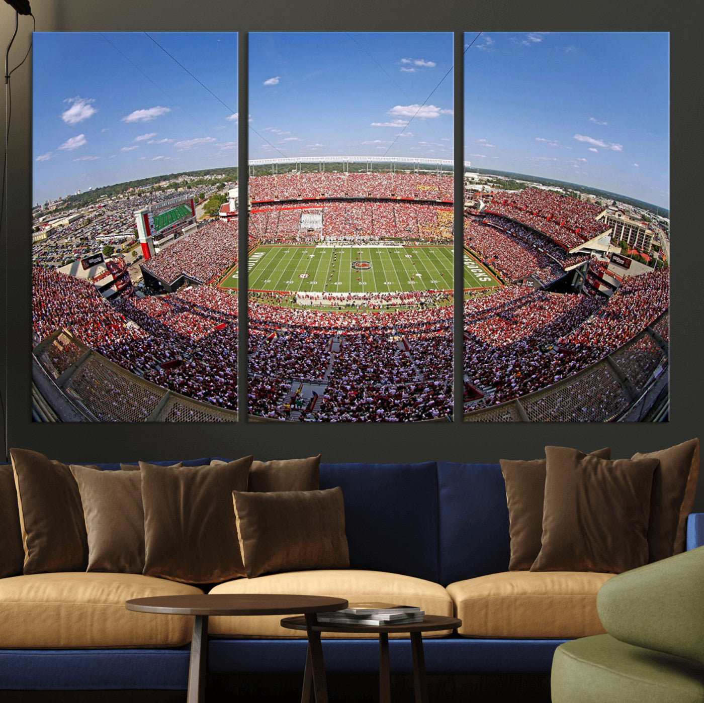 An William Brice-Stadium view of a full football stadium with cheering fans and clear blue skies, capturing the excitement and energy of the game.