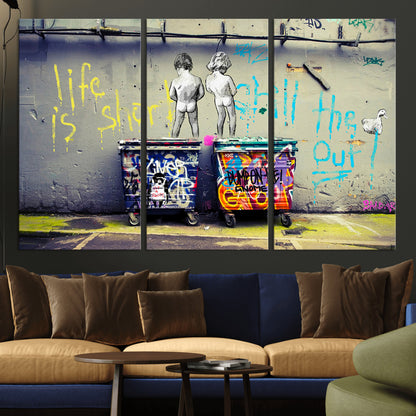 Graffiti-style canvas art with bold text and two naked figures over urban dumpsters, ideal for edgy or street-style decor.