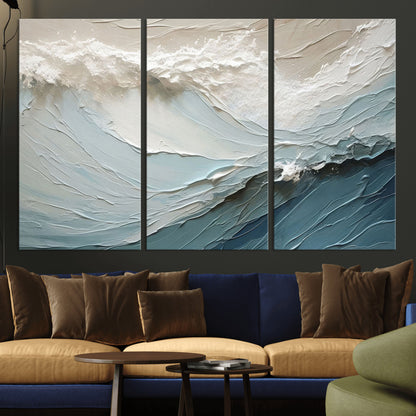 Textured canvas of ocean waves in soft coastal blues and creamy whites, ideal for modern or minimalist coastal-style interiors.