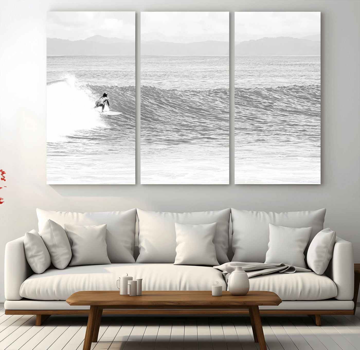 Monochrome photo of a surfer riding a wave with distant mountains, ideal for coastal motion or black and white surf-themed wall decor.