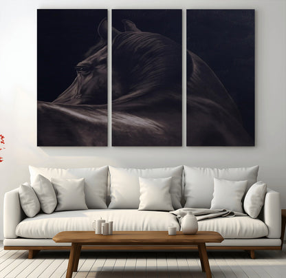 Close-up of a black horse with dramatic lighting on a dark background, perfect for rustic or masculine home decor.