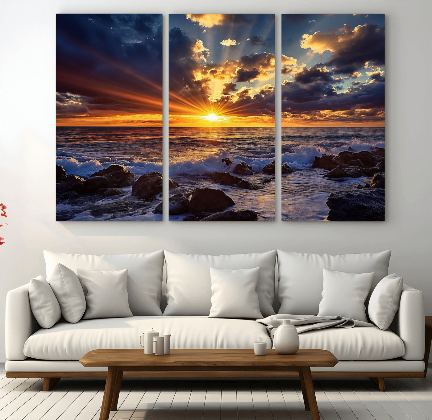 An explosive sunset over the ocean with dramatic clouds and rays of sunlight reflecting off the water, creating a vibrant and captivating view.