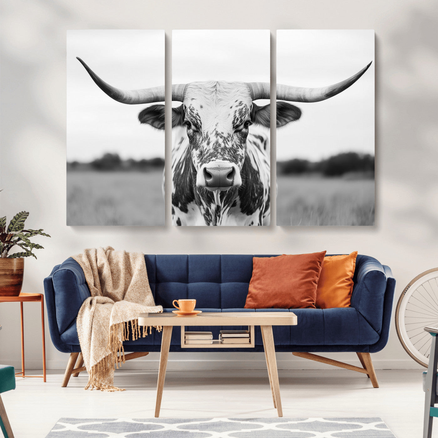 Capture the strength and elegance of nature with this striking black and white portrait of a longhorn cow. Its powerful presence makes a bold statement in any room.