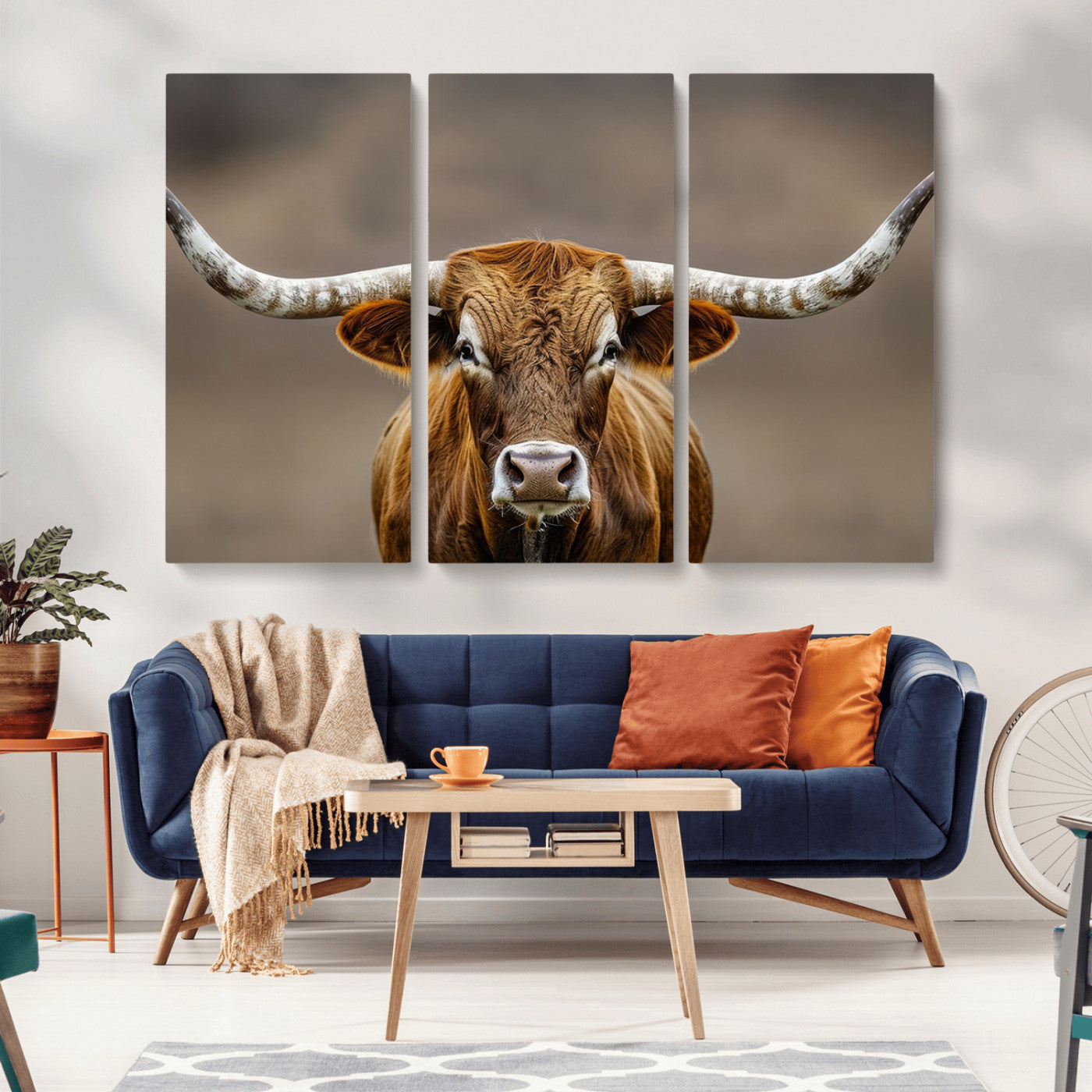 Close-up of a Texas Longhorn with strong curved horns and warm brown tones, perfect for rustic or western-style wall decor.