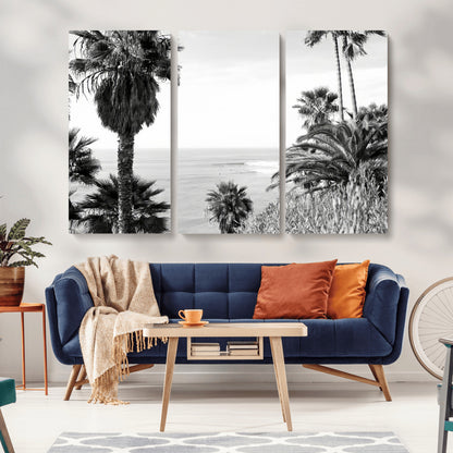 Monochrome canvas of palm trees framing a coastal surf scene, perfect for California-inspired or retro black-and-white beach decor.