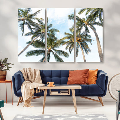 Framed canvas of tall palm trees reaching into a tropical sky, ideal for beach home or relaxed island-inspired wall decor.