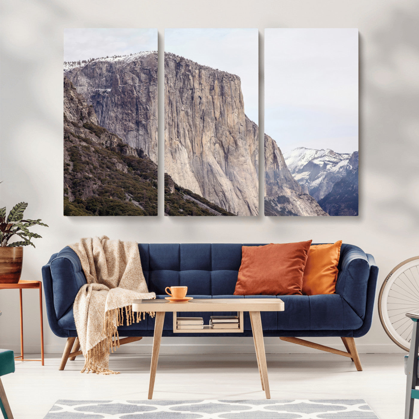 Framed canvas of El Capitan’s vertical granite face in Yosemite with snowy peaks, ideal for Sierra minimalism or mountain-inspired decor.