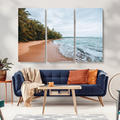 Framed canvas of a tropical beach with palm trees and soft waves, ideal for coastal escape or serene nature-inspired home decor.