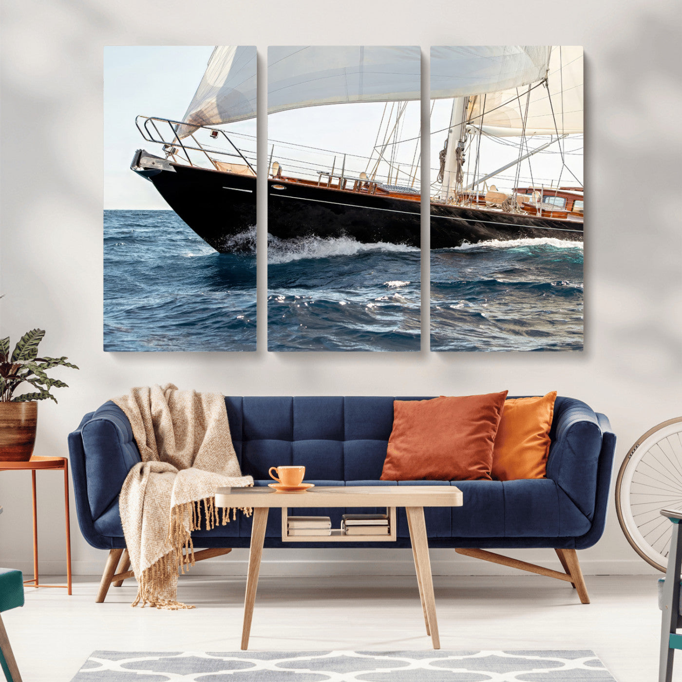 Close-up of a classic sailing yacht with wooden deck and full sails, perfect for nautical or coastal-style decor in ocean-themed spaces.